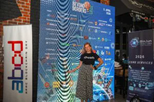 Dash contributor at the Beyond Borders 2026 conference backdrop